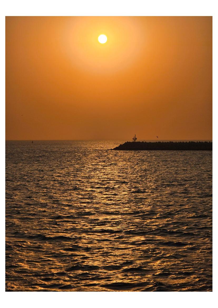 Sun over the breakwater